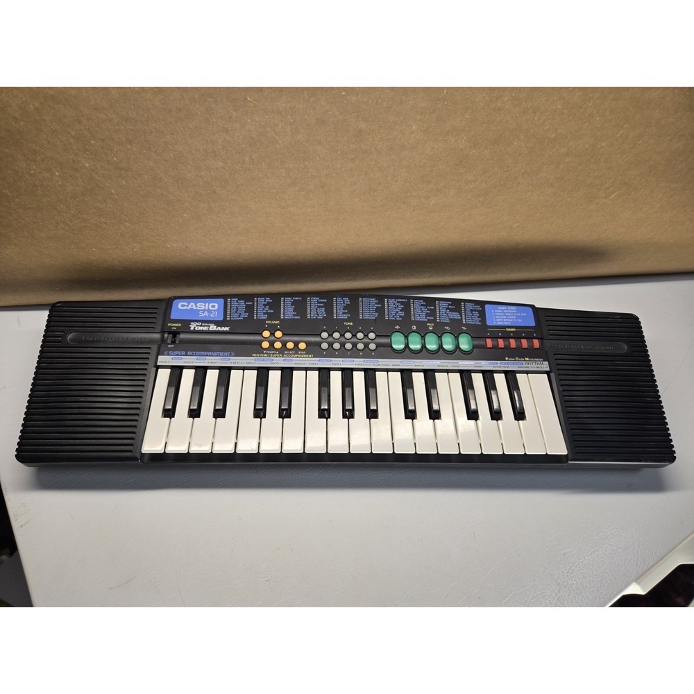 Casio SA-21 Electric Synth Keyboard Portable 100 Sound Tone Bank Dual Speakers